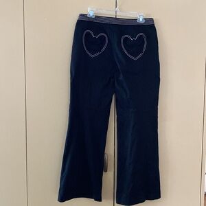 Contrast embroidered whimsigoth mid-rise pants with hearts & butterfly appliqués